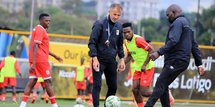 Coach Micho and his assistant, Basena, at a Cranes training session