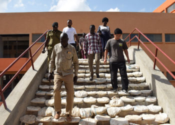 FLYOVER. Kitgum RDC William Komakech and other district officials tour the incomplete flyover that connects the two blocks of Kitgum Central Market, a month ago.