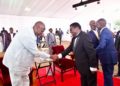 The President's brother, Gen Salim Saleh,(left) meets DP President Norbert Mao at Mao's homecoming at Kaunda Grounds in Gulu City on July 22, 2023.
