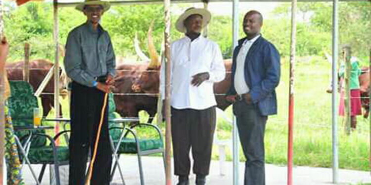 Andrew Mwenda (right) poses with Rwanda President Paul Kagame (left) and President Yoweri Museveni of Uganda. COURTESY PHOTO.