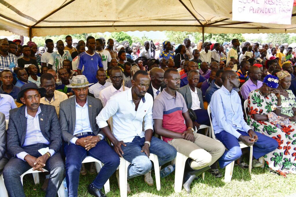 Residents listen to President Museveni at Okidi Parish in Atiak Sub-county, Amuru District, on November 3, 2023. President Museveni discussed with leaders from Acholi the issue of Balaalo nomadic pastoralists. COURTESY PHOTO.