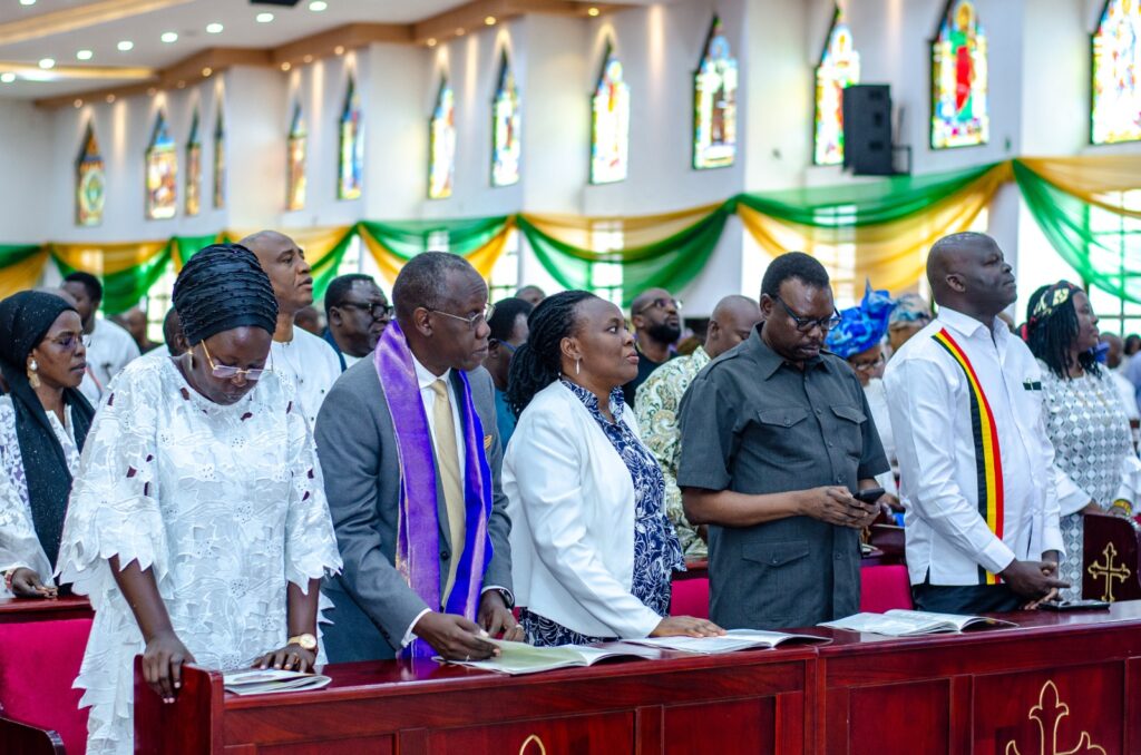 A section of Ugandans in Nigeria's federal capital, Abuja, led by Ambassador Philip Odida, the Deputy Head of Mission (2nd left), during the funeral service in Abuja, Nigeria.