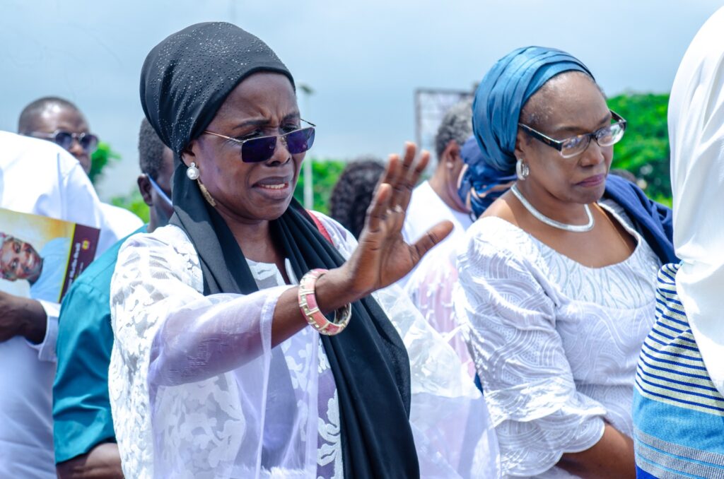 Ugandan-born Dr Juliet Essene waves goodbye to Prof Okello Oculi, who was her guardian in Abuja, Nigeria.